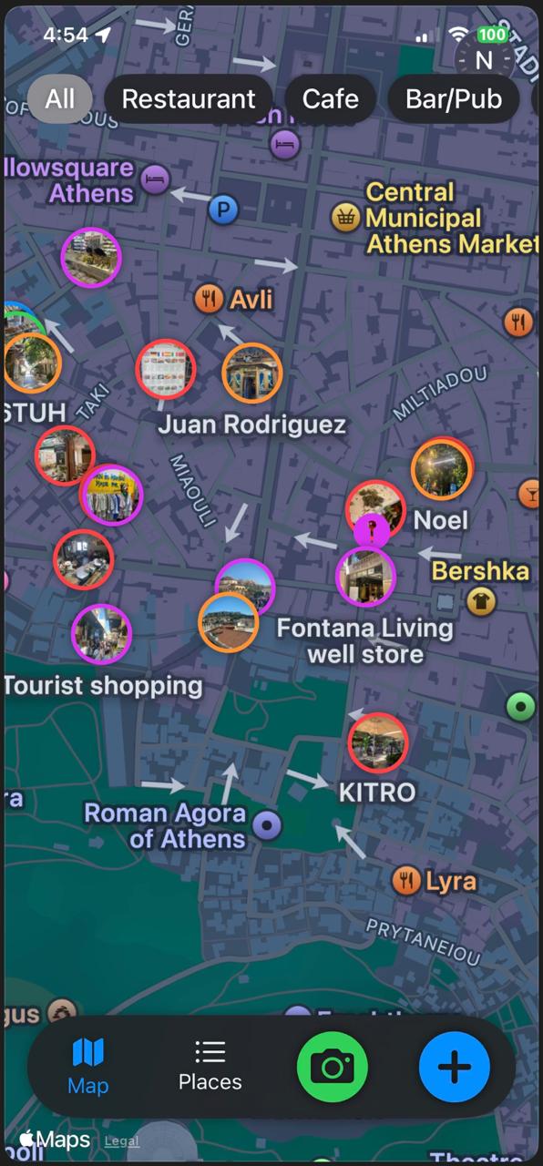 Map of central Athens with saved places shown as photo pins and category filters